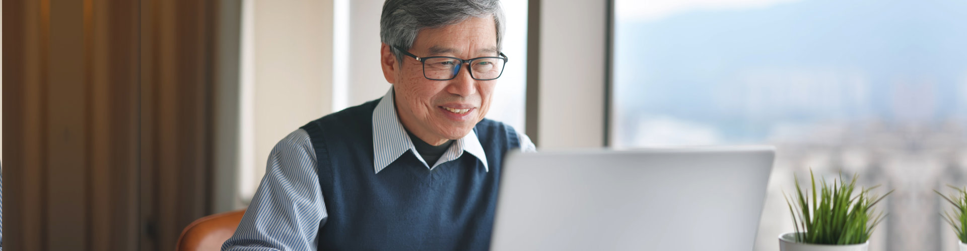 senior man using the laptop